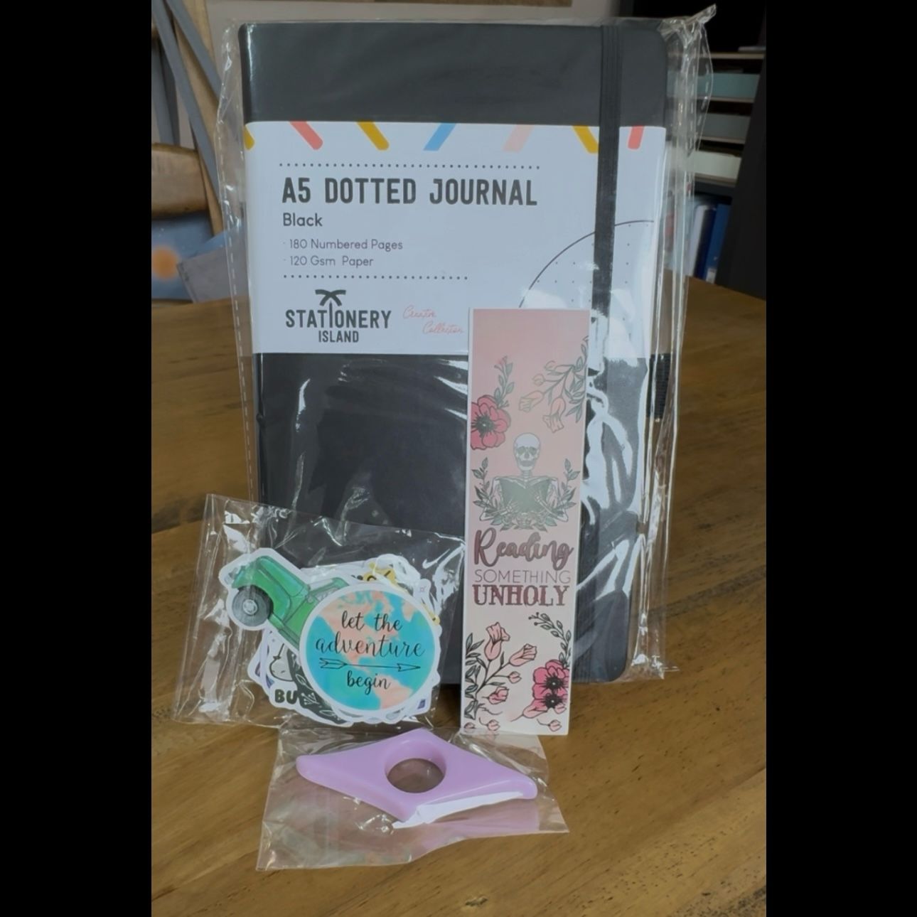 A sample Doodles & Details Journaling Kit with a journal, stickers, and washi tape